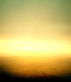 Sun shining through clouds