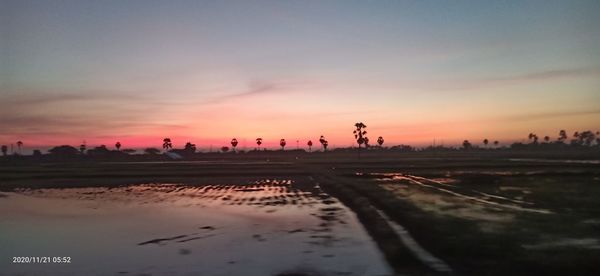 Scenic view of silhouette landscape against sky during sunset