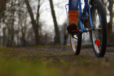 Low section of bicycle on field