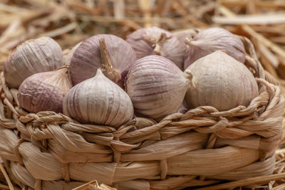 Close-up of onions in basket