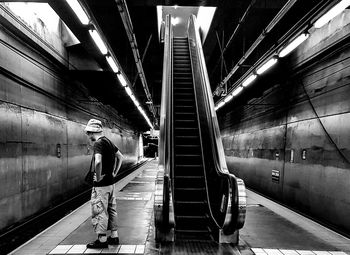 Rear view of man at subway station