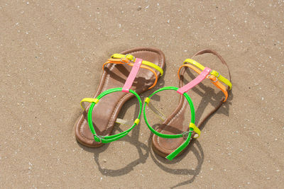 High angle view of multi colored sand on beach