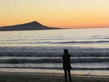 Scenic view of sea at sunset