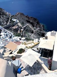 High angle view of buildings in sea, oia, greece, santorini 
