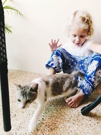 Full length of girl playing