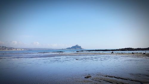 Scenic view of beach against sky