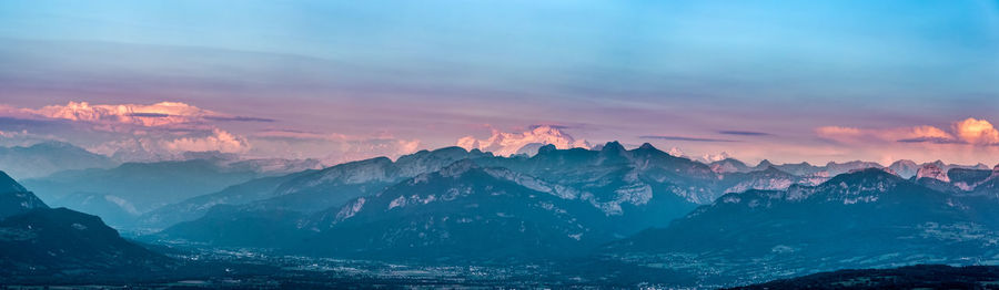 Scenic view of mountains against sky during sunset