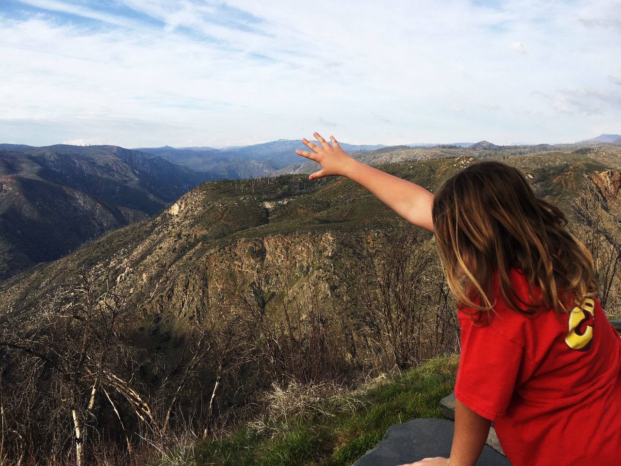 real people, one person, leisure activity, girls, sky, lifestyles, scenics, outdoors, nature, one girl only, beauty in nature, landscape, mountain, adventure, day, childhood, vacations, people, human hand