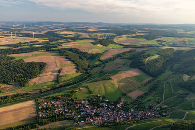 Aerial view of agricultural field against sky