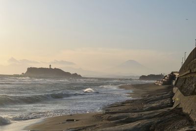 Scenic view of sea against sky during sunset