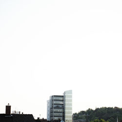 Low angle view of buildings against clear sky