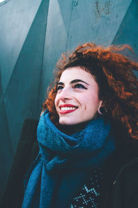 Portrait of smiling young woman in winter