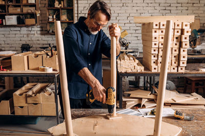 Carpenter working at workshop