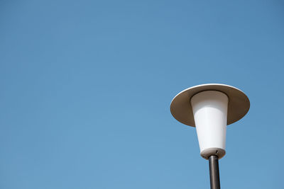 Low angle view of street light against clear sky