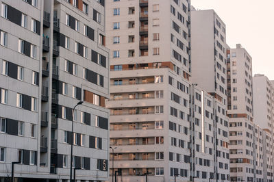 Low angle view of buildings against clear sky