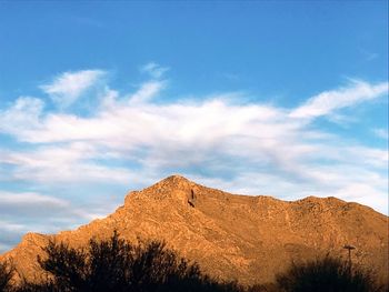 Low angle view of mountain range against sky