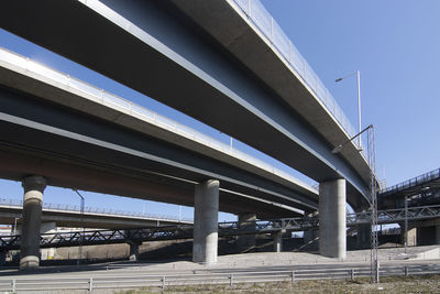 Low angle view of elevated road against sky