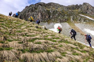 People walking on mountain road