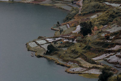 High angle view of building by lake