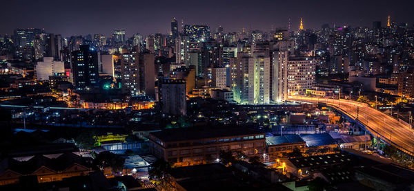 Aerial view of illuminated cityscape at night