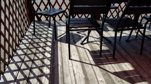 High angle view of empty chairs and table in restaurant