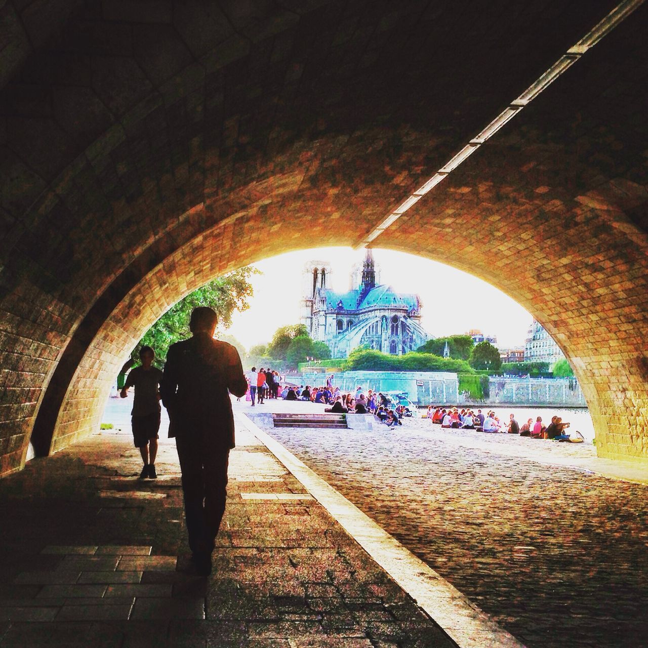 arch, walking, men, architecture, built structure, person, lifestyles, the way forward, tunnel, full length, leisure activity, street, large group of people, archway, rear view, indoors, incidental people, travel, transportation