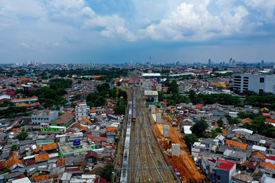 High angle view of city buildings and rail way connection