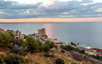 Aerial view of roseto capo spulico during a beautiful sunset over the sea