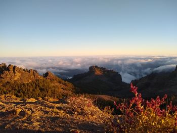 Scenic view of mountains against sky during sunset