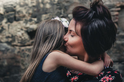 Mother and daughter at home