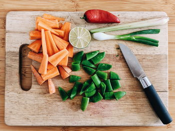 High angle view of chopped vegetables on cutting board