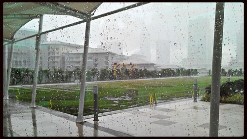 Wet glass window in rainy season