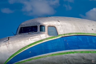 Low angle view of airplane against sky