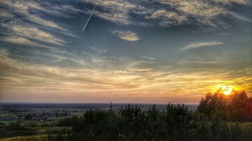 Scenic view of sea against sky at sunset