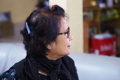 Portrait of woman looking away