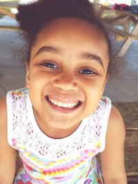 Close-up portrait of a smiling girl
