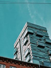 Low angle view of building against blue sky