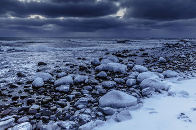 Scenic view of sea shore during winter