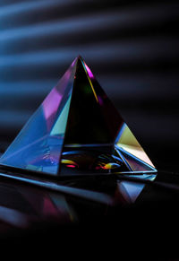 Close-up of prism on table