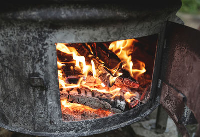 High angle view of fire on wood