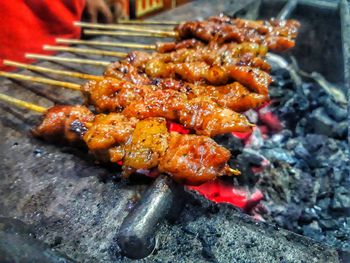 High angle view of meat on barbecue grill