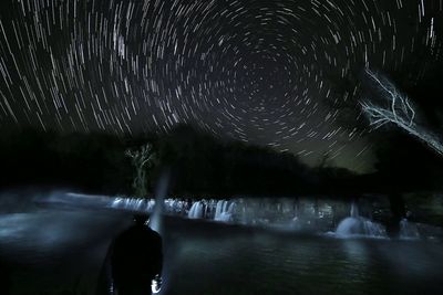 Silhouette of people at night