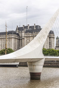 Beautiful view to modern bridge and buildings in puerto madero