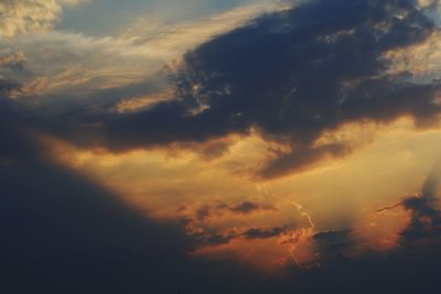 Low angle view of dramatic sky during sunset