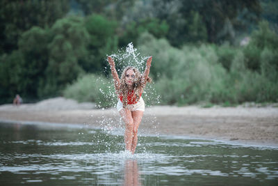 Low angle view of child on water