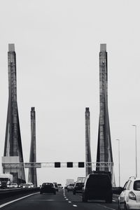 Bridge against sky in city