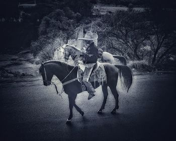 People riding in park