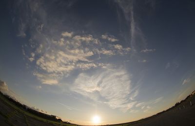 Scenic view of landscape against sky during sunset