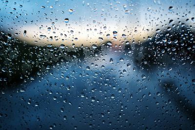 Full frame shot of wet glass window