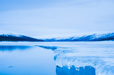 Close up of ice on still winter lake